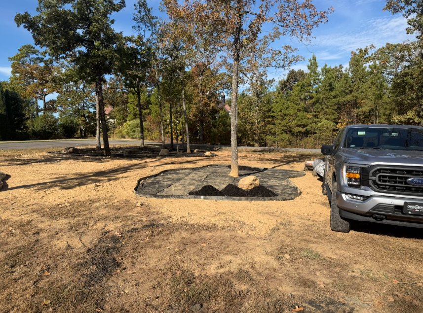 Planting bed prepped with landscape fabric before mulching